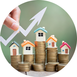 Toy houses on stacks of coins representing an independent current market valuation from SAM Conveyancing