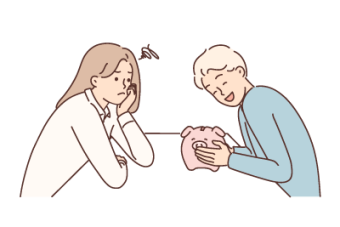 A young couple sat at a table reviewing their assets before getting married with the help of SAM Conveyancing - protecting assets before marriage