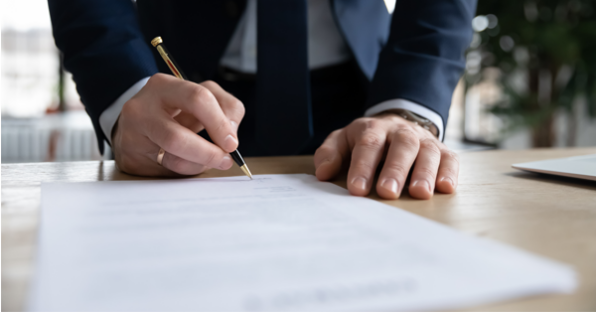 A man filling out a mortgage for non-uk citizenapplication form with the help of SAM Conveyancing