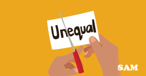 Hands with scissors cutting a piece of paper that says unequal as a sign of an unequal share in property