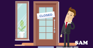 A man stood outside of a conveyancing solicitor office which has ceased trading and is closed