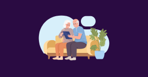 An elderly couple sat on a sofa looking through their lease extension contract with the help of SAM Conveyancing.