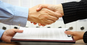 Buyer and Seller reaching an agreement on legal documents. SAM Conveyancing's guide on what exchange of contracts in conveyancing is  Buyer and Seller reaching an agreement on legal documents. SAM Conveyancing's guide on what exchange of contracts in conveyancing is