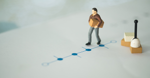 A figure holding moving boxes stands at the beginning of a timeline for How Long to Move House Once Offer Accepted, No Chain. SAM Conveyancing explains conveyancing timeframes when there is no onward chain.  A figure holding moving boxes stands at the beginning of a timeline for How Long to Move House Once Offer Accepted, No Chain. SAM Conveyancing explains conveyancing timeframes when there is no onward chain.