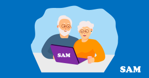 An elderly couple sat at their laptop looking at Older Persons Shared Ownership (OPSO) information on the SAM Conveyancing website