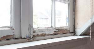 Chipped paint and cracked wood on window. SAM Conveyancing's guide on handling a rotten window frame Chipped paint and cracked wood on window. SAM Conveyancing's guide on handling a rotten window frame