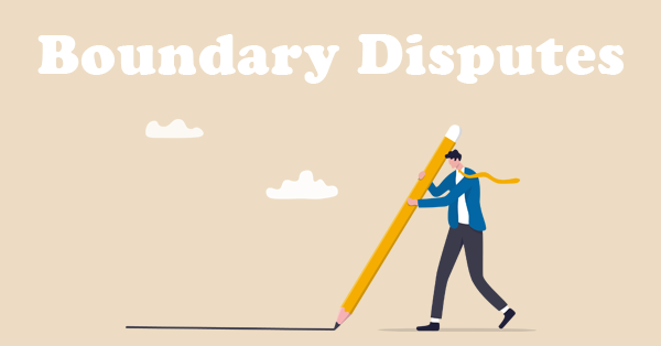 Man outlining boundaries. SAM Conveyancing's guide on boundary disputes