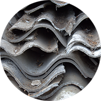 Asbestos roofing, an example of many asbestos containing materials which will be flagged if present during a RICS Home Survey from SAM Conveyancing.