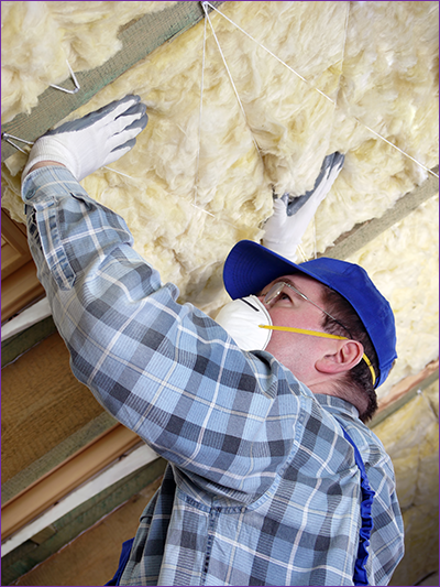 Picture of man fitting insulation near to information about Cavity-Wall-Insulation-Cost