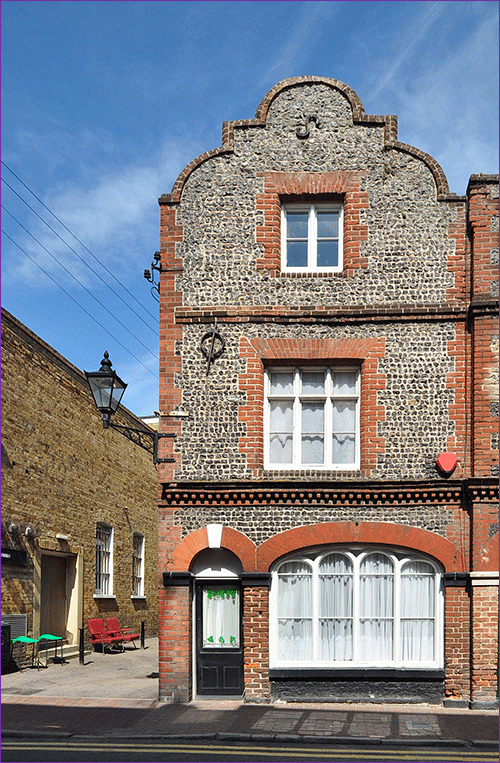 Flint and brick property from early 17th Century
