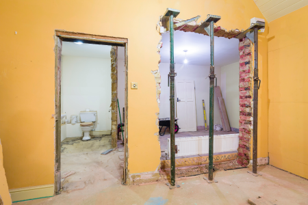 A load bearing wall structure with steel beam support. SAM Conveyancing explains how to remove a load bearing wall including labour costs involved