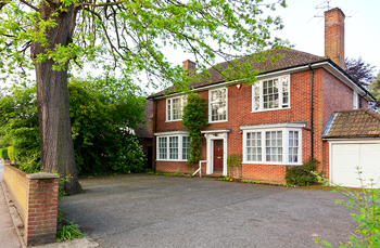 A picture of a nice detached house made more affordable by cheap conveyancing solicitors