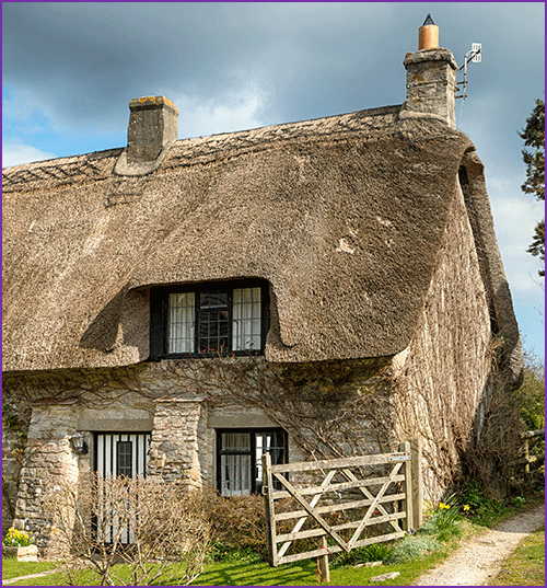 Pre-Georgian Home with thatched roof.