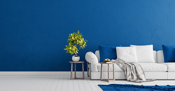 A sofa and side table in a living space. Add value to your home with SAM Conveyancing, assisting with a garage conversion or a loft conversion and ensuring building regulations are met.