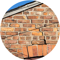 Cracks in the wall to be investigated in a subsidence survey from SAM Conveyancing